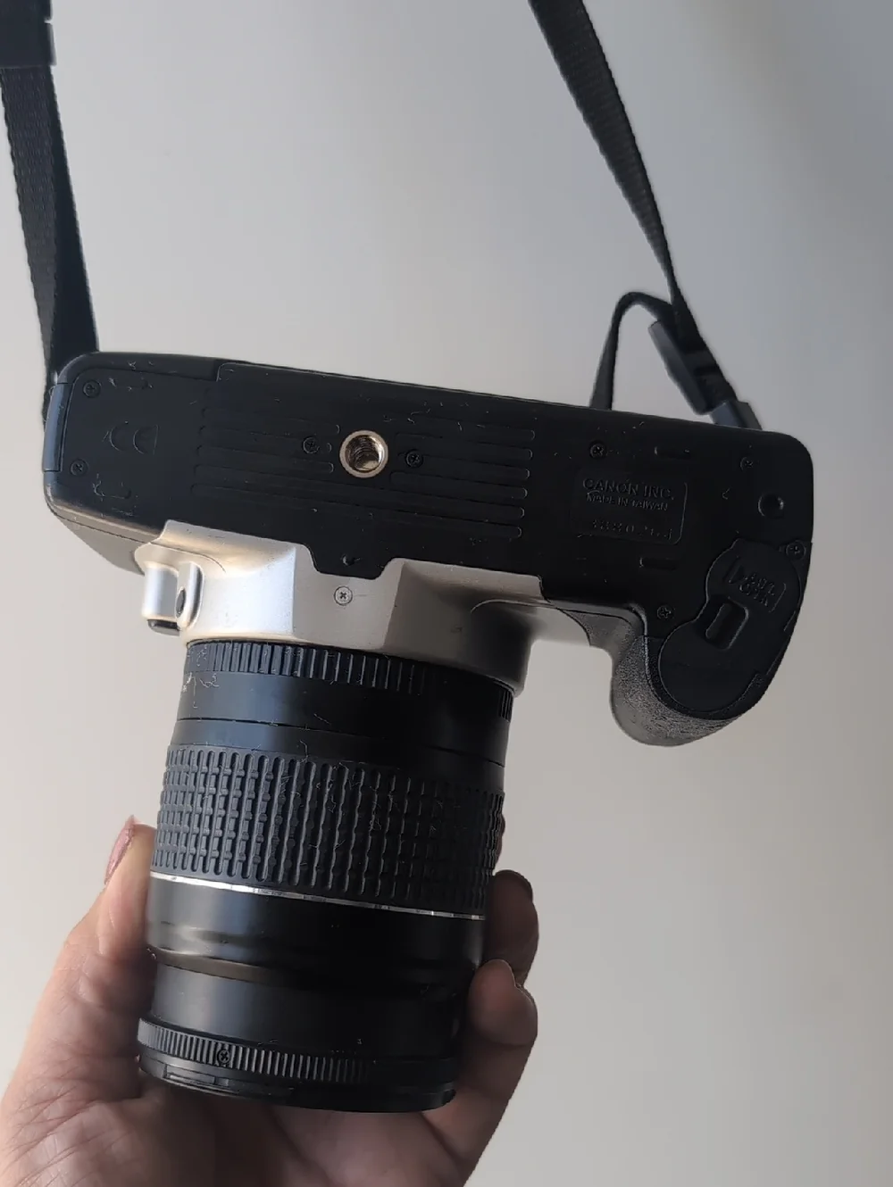 Vintage Canon Silver and Black Camera with Zoom Lens